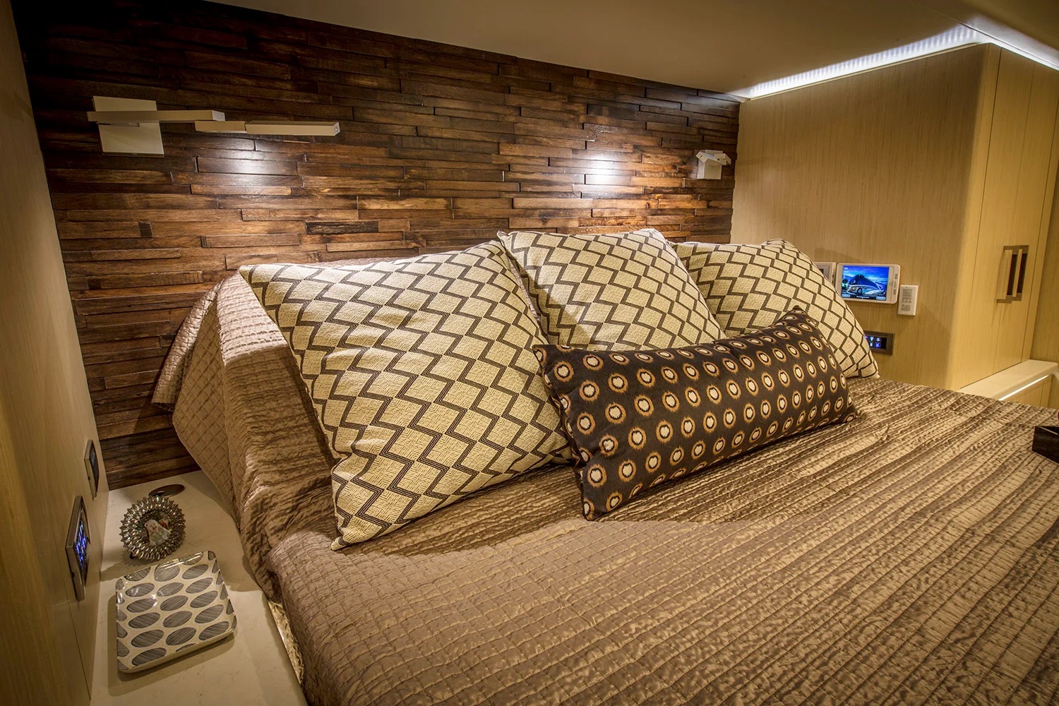 Master bedroom with wood accent wall