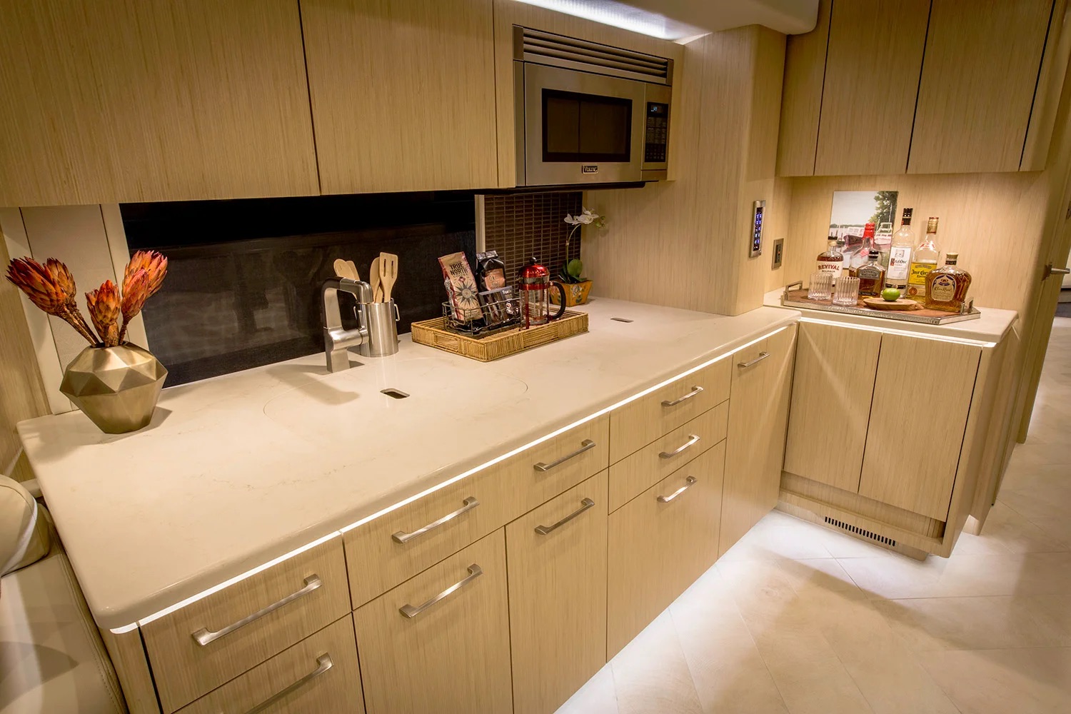 Galley kitchen with bar area