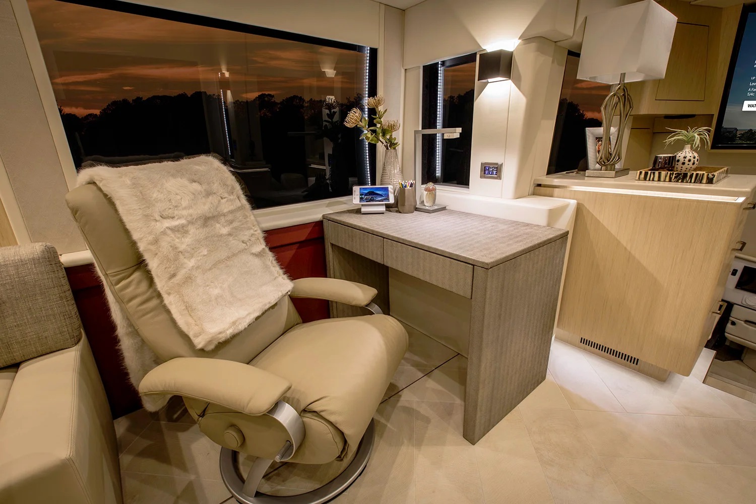 Lounge recliner at sunset window